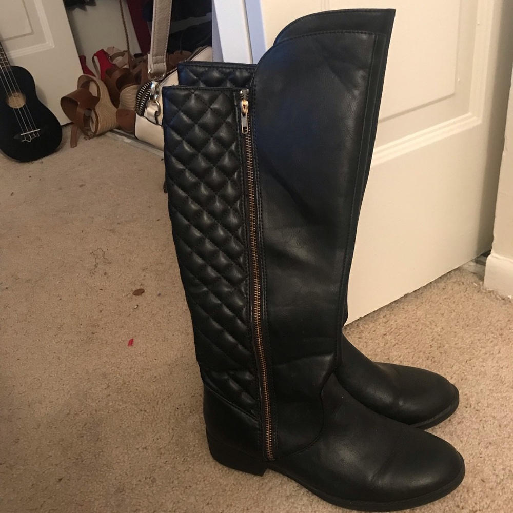 Tall black boots